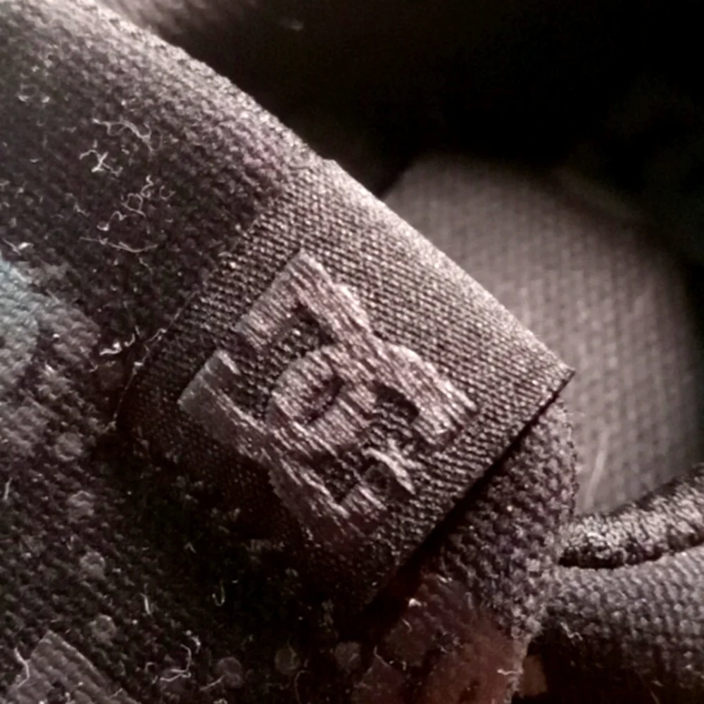 DC SHOES canvas slip on all over logo skate shoes